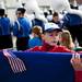 A youngster fixes the boy scout troop's banner before the parade on Monday, May 27. Daniel Brenner I AnnArbor.com
